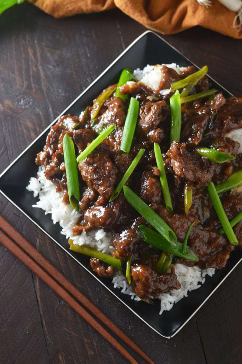 Tender strips of premium beef wok-seared to perfection, coated in a rich savory-sweet soy-based sauce, and paired with crisp green onions. Served over steamed rice, this dish delivers bold flavor in every bite — a comforting classic you’ll crave again and again at Shaanxi Graden Chinese Restaurant，a Chinese Restaurant in Mesa