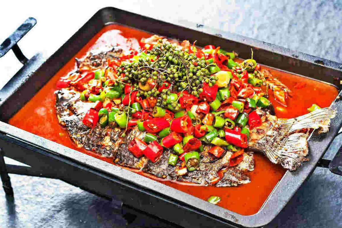 Whole fish grilled to perfection, then simmered in a bold broth of chili peppers, Sichuan peppercorns, and our house-made sauce. Crispy outside, tender inside, and packed with numbing heat and deep umami. A sizzling centerpiece perfect for sharing at Shaanxi Graden Chinese Restaurant，a Chinese Restaurant in Mesa